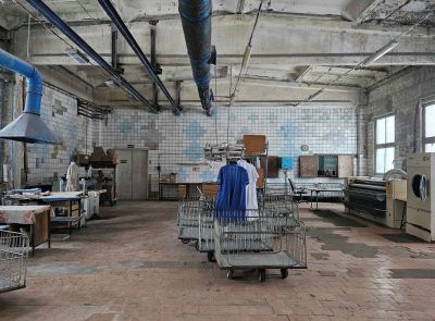 Изолированное помещение с инв.№320/D-36945 общей площадью 420,9 кв.м., наименование – механическая прачечная.,  расположенный по адресу: Гомельская обл., Жлобинский р-н, г. Жлобин, ул. Волкова, 1-7.